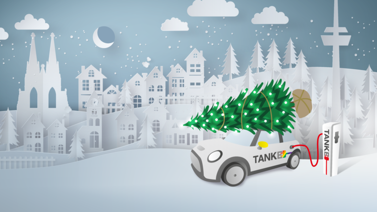 Illustration von TankE Auto und TankE Ladesäule vor winterlichem Köln